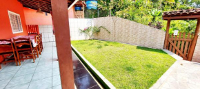 Casa Rosa Espaçosa com Vista Mar